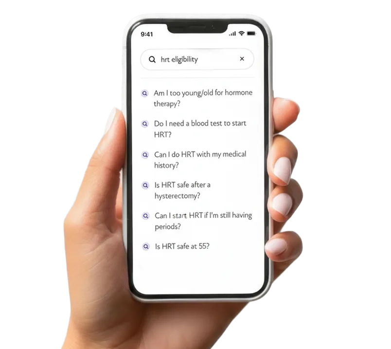Hand holding phone showing HRT eligibility search