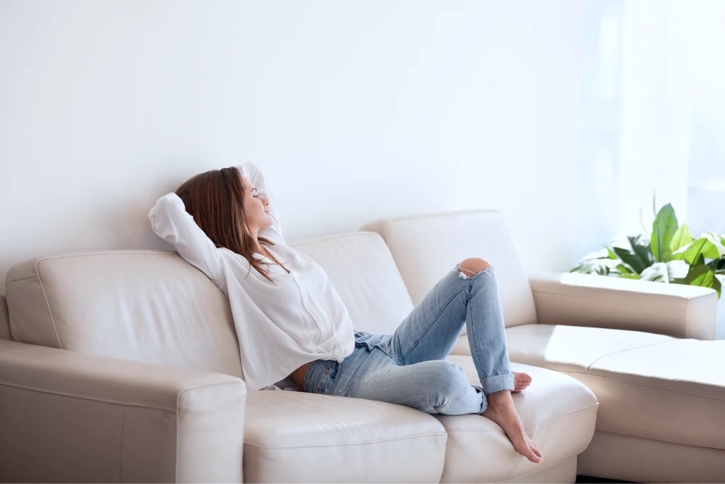 Woman relaxing on a sofa